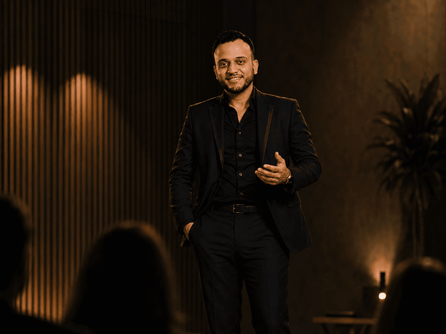Asif Sayed delivering a leadership keynote on stage